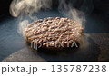 A delicious looking patty being cooked 135787238