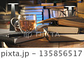 Open book with eyeglasses and tea cup on wooden table indoors 135856517