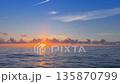 Mediterranean Sea sunrise over calm water and horizon 135870799