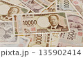 Japanese banknotes. Zooming in. 135902414