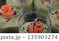 Smoked salmon shot glasses guacamole served with homemade crackers 135903274