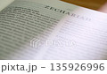 Extreme Close Up White Pages Turning in Modern Holy Bible Zechariah Book 135926996