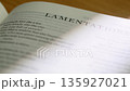 Extreme Close Up White Pages Turning in Modern Holy Bible Lamentations Book 135927021