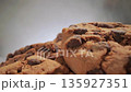 Close-up of freshly baked oatmeal cookies with chocolate chips, camera moves slowly 135927351