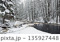 Lindulovskaya grove, an ecological trail, a calm winding river in a snowy forest, trees under the snow in the forest, peace and quiet, reflection on the water, without people 135927448