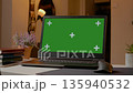 Laptop with Green Screen in Home Office Setup 135940532
