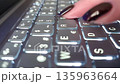 Female hands typing on grey laptop. High quality FullHD footage 135963664
