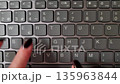 Female hands typing on grey laptop. High quality FullHD footage 135963844
