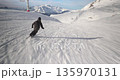 Skier fast follow action shot skiing 135970131