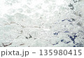snow pattern on window glass 135980415