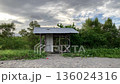 Fisherman's hut canopy for shelter from the weather is made of bamboo and leaves 136024316