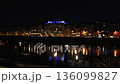 Panoramic night view of Lyon riverside with bridge and reflections 136099827