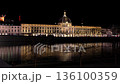 Illuminated Hotel Dieu and Rhone river reflections at night Lyon 136100359