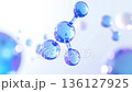 A loop video of blue, transparent beauty ingredient molecules slowly rotating and floating 136127925