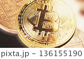A gold coin with the Bitcoin logo. Cryptocurrencies and blockchains. High quality 4k footage 136155190