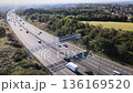 Aerial view of uk m6 motorway traffic commuting towards birmingham 136169520