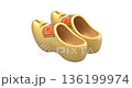 Rotation of traditional yellow dutch wooden shoes on white background - 3D animation isolated on white background seamlessly loopable 136199974