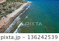 Waves on a wild beach on the southern shore of sea. Kyrgyzstan travel destination. Turquoise water. Aerial drone footage 136242539