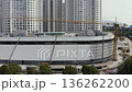 Construction site crane working on a skyscraper 136262200