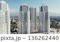 Rising aerial view of modern skyscraper construction 136262440