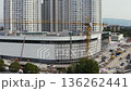 Construction site with cranes and skyscrapers 136262441