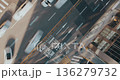 Aerial view of busy traffic illustrating vehicles navigating intersections, highlighting the movement and organization of urban transportation systems. Time-lapse, Seoul, South Korea 136279732