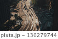 Aerial view of city traffic illustrating vehicles moving through intersections and crosswalks, highlighting the dynamic flow of urban transportation. Time-lapse, Seoul, South Korea 136279744