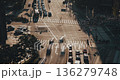 A bustling city intersection captures vehicles moving and pedestrians navigating crosswalks, illustrating the rhythm of urban life and continuous motion. Time-lapse, Seoul, South Korea 136279748