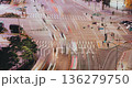 An urban intersection captures the flow of vehicles and pedestrians navigating crosswalks under city lights, highlighting movement and activity. Time-lapse, Seoul, South Korea 136279750