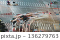 A vibrant urban traffic scene depicts cars maneuvering through intersections with changing traffic signals and dynamic motion blur effects. Time-lapse, Seoul, South Korea 136279763