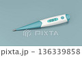 Digital medical body thermometer on shiny desk 136339858