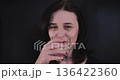 Adult Woman Swallowing a Pill Health Supplement Concept 136422360