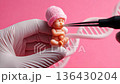 Newborn Genetics Concept with Baby Model and DNA Helix 136430204