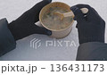 Warm soup enjoyed in snowy environment during cold winter day outside 136431173