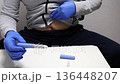 Man preparing semaglutide injection for weight loss and diabetes. 136448207