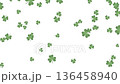 Falling green shamrocks animation on white background for St. Patrick's Day. 136458940