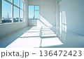 White minimalist empty room space with natural morning light streaming in through large windows (copy space available) 136472423