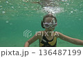 Little girl diving in shallow ocean water 136487199