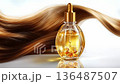 Learn how to use hair oil for shiny and healthy hair in simple steps at home 136487507