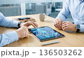 Business Professionals Analyzing Charts on Tablet Data Strategy Concept 136503262