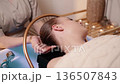 A woman relaxes at a Japanese spa. 136507843