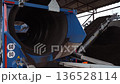 The equipment at the compost plant processes organic waste, and the ready-made stabilized organic fertilizer is sifted through a sieve, and a mixture for soil fertilization is produced 136528114