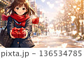 Smiling high school girl giving a present in a snowy town Valentine's Day image 136534785