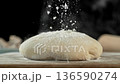 The dough on the kitchen table with falling flour . Filmed on a high-speed cinema camera at 1000 fps 136590274