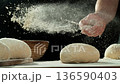 Super Slow Motion of a Baker Throwing Flour Around. Filmed on High Speed Cinema Camera, 1000 fps. Closeup of Dough Preparation. 136590403