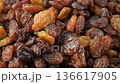 Macro texture of brown raisins, food background. 136617905
