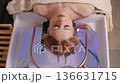 A woman relaxes at a Japanese spa. 136631715