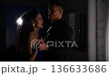 Romantic Night Dance Scene, Couple Sharing Tender Dance Illuminated By Dramatic Lighting In Studio, Couple Performs Gentle Dance With Soft Lighting And Emotional Atmosphere In Studio Loft 136633686