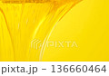 Macro Texture Of Liquid Fresh Honey Pouring On Yellow Background. 136660464