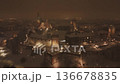 Evening drone orbit around snowy Wawel Castle in winter.  136678835